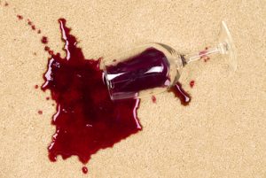 A glass of spilled wine on brand new carpet is sure to leave a stain.