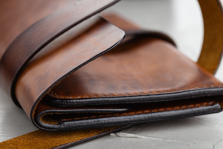 Closeup stylish handmade brown leather wallet